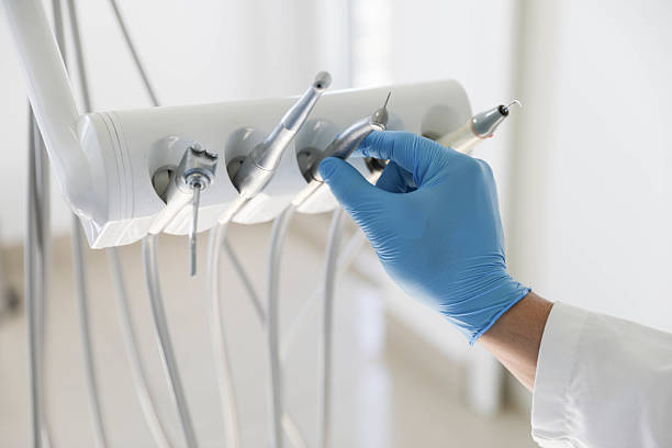 Professional Dental Implants technician working in Augusta, ME